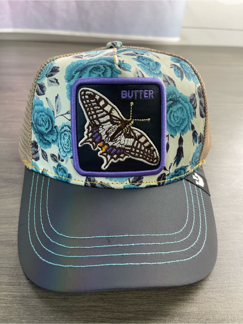 Othr Floral Butterfly Trucker Cap in Teal, Black and Tan